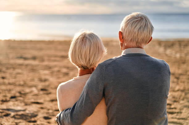 istock Senior couple on the beach 1441134507