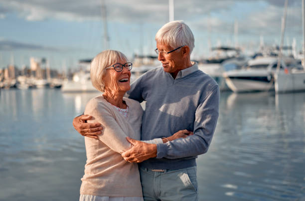 istock Senior couple on the beach 1441135295