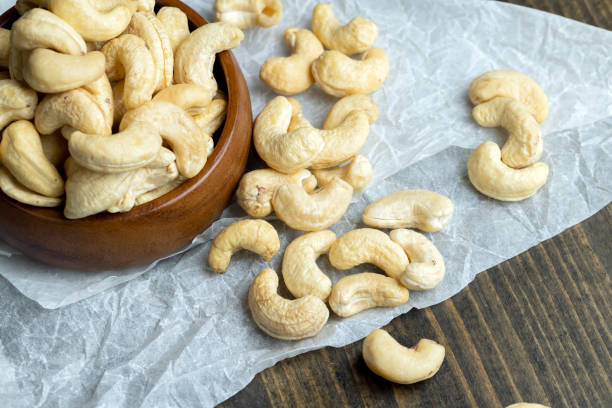 istock Fresh peeled cashew nuts on the table 1441136880