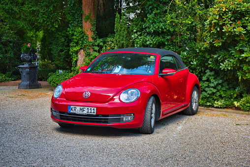Baden-Baden, Germany - 10 July 2022: red Volkswagen Beetle 3, oldtimer meeting in Kurpark