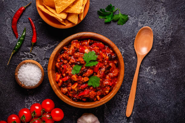 istock Chili Con Carne in bowl on dark background. 1441139028