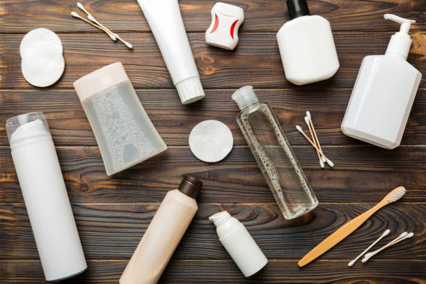 istock Mockup for bathing products top view flat lay, spa razor, toothpaste, soap, gel and other various accessories. Cosmetics for skin health. Bath Mockup for your logo 1441144075