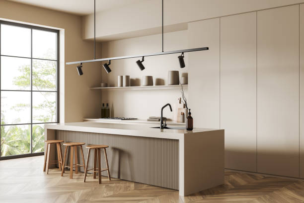 istock Beige kitchen interior with bar countertop and seats, panoramic window 1441144487