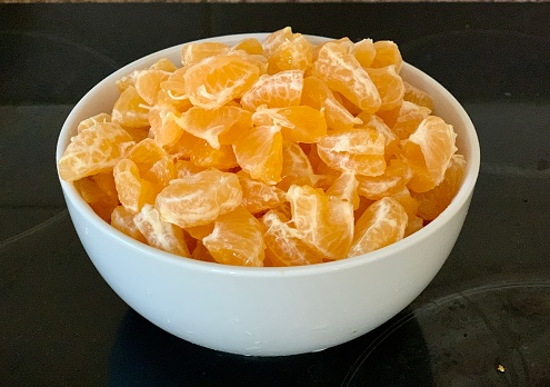 Bowl of peeled  tangerines