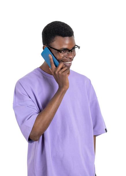 istock African businessman talking on the smartphone. Isolated over white background 1441145449