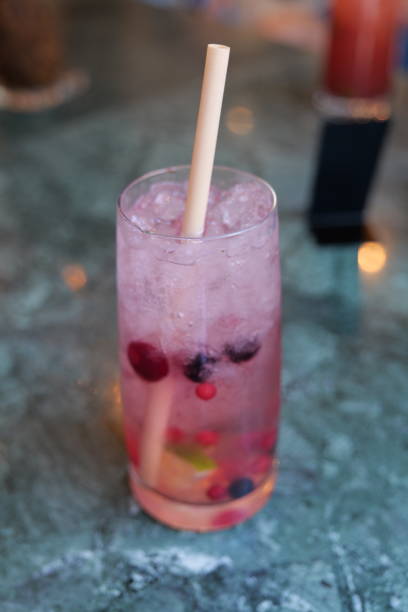 istock Pink cocktail drink with red berries 1441148450