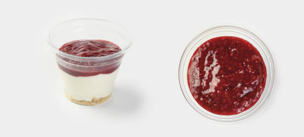 istock yogurt with raspberry jam on a white background in a container for a food delivery service 1441151529