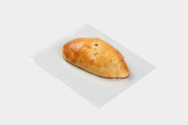 istock oval sweet bun with fruit filling on a light background 1441151600