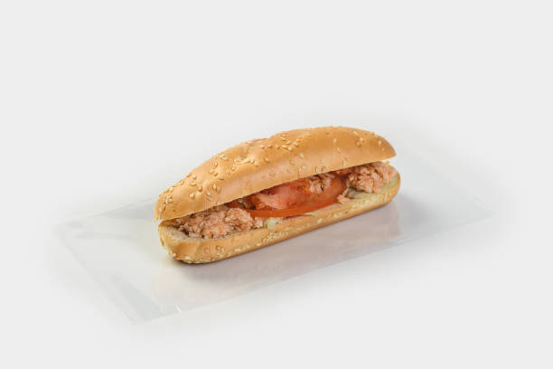 istock baguette with chopped chicken, tomatoes and herbs on a light background 1441151667