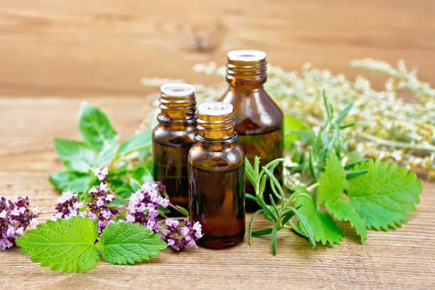 istock Oil with herbs and wormwood on board 1441153188