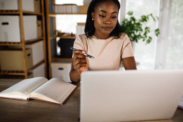istock Young businesswoman working on a project 1441153312