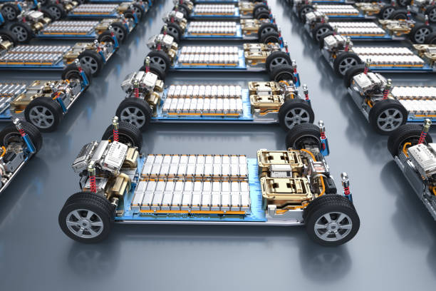 Group of electric cars with pack of battery cells module on platform stock photo