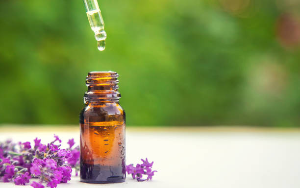 istock Lavender essential oil in a small bottle. Selective focus. 1441155458