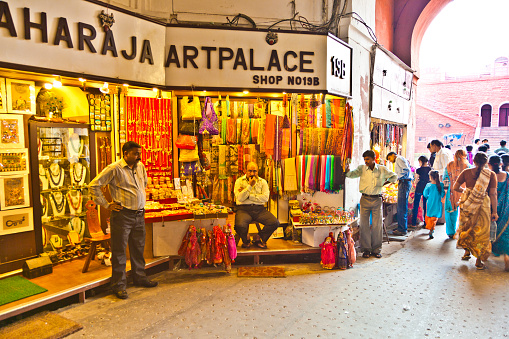 New Delhi, Inia - November 9, 2011: people shop inside the  Meena Bazaar in the Red Fort in New Delhi, India. Mukarmat Khan built this  first covered bazaar in the 17th century.