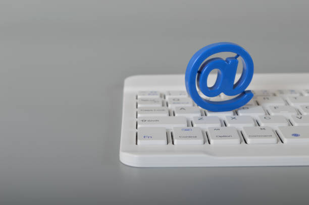 Computer keyboard and email address symbol. Email marketing and internet email communication concept.