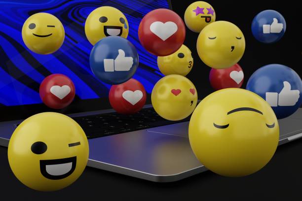 istock Emoticons coming out of the computer, laptop. 1441160958