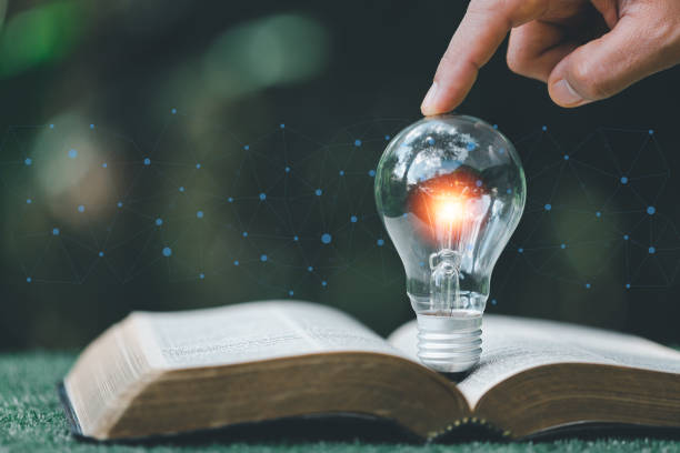 istock Bright light bulb and icon with book. Business success idea and education or learning online concept. Business person achievement and inspiration. technology, Create Imagination for Inspiration. 1441161002