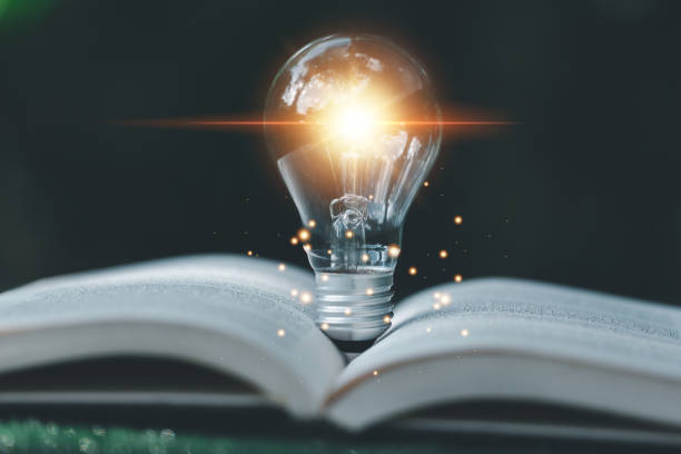 istock Bright light bulb and icon with book. Business success idea and education or learning online concept. Business person achievement and inspiration. technology, Create Imagination for Inspiration. 1441161043