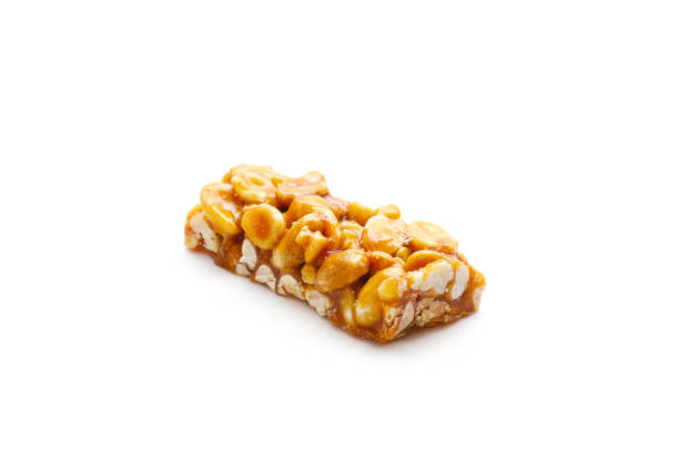 istock Kozinak from pistachios on a white background. Close-up 1441161111