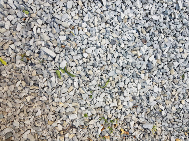 istock Grey background of stones, top view 1441162673