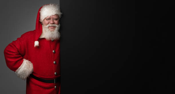 istock Santa Claus holding banner 1441166718