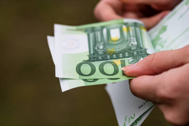 istock Shot of hands counting EURO banknotes 1441170147