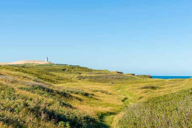 istock Rubjerg Knude Lighthouse on a hill against the blue sky 1441170665