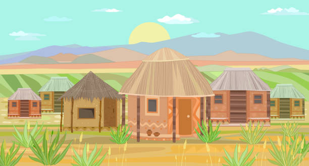 African landscape with sunrise and huts.