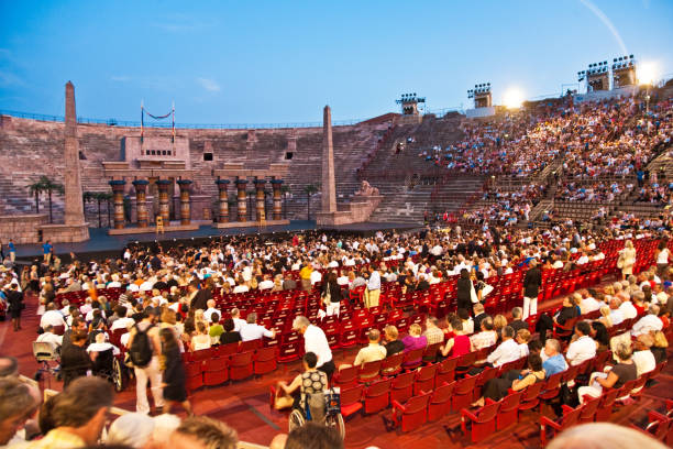 people are waiting for the start of the opera in the arena of verona Verona, Italy- August 5, 2009: people are waiting for the start of the opera in the arena of verona in Verona, Italy. verona opera stock pictures, royalty-free photos & images