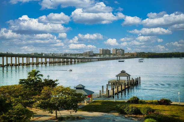 istock Seascape with a wooden pier under a blue cloudy sky 1441173703