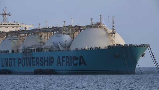 Dakar, Senegal – July 04, 2022: A gas container ship sailing near the Dakar coast, Senegal.