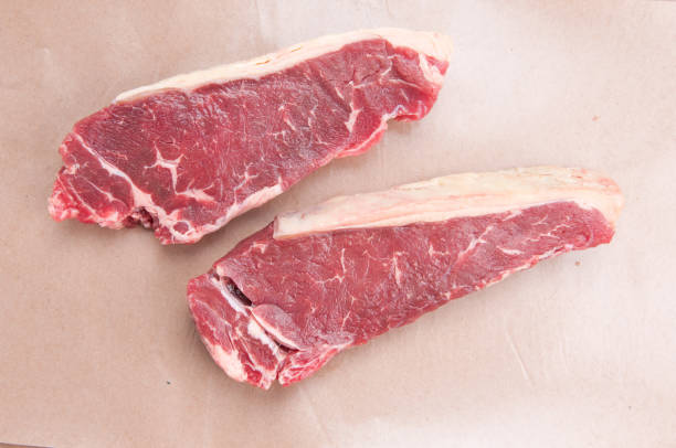istock raw new york strip steak 1441174483