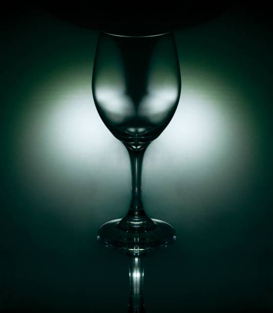 istock Hurricane shadow in a wine glass on a dark background 1441174657