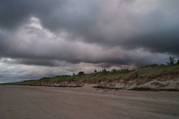 istock Dark clouds over the beach in Palanga, Baltic sea, Lithuania 1441176290