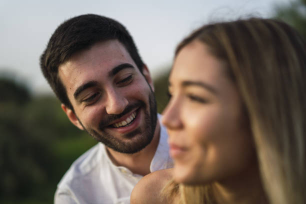 istock Spanish Caucasian couple hanging out in a park during daylight 1441177975