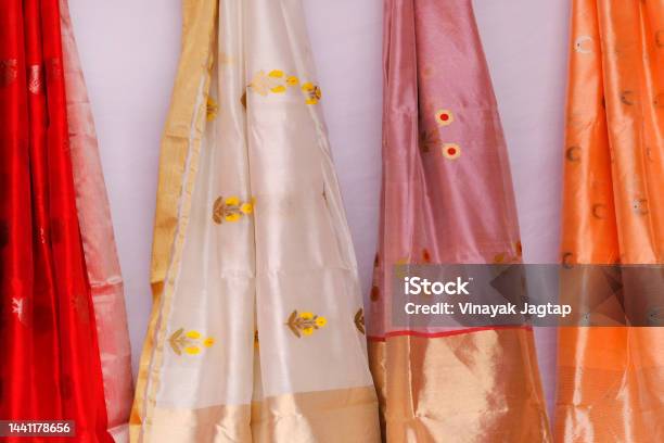 Handmade Indian Silk Sari Saree With Golden Details Woman Wear On Festival Ceremony And Weddings Expensive Sarees Are Famous For Their Gold And Silver Zari Brocade Incredible India Stock Photo - Download Image Now