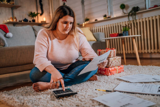 istock Worried woman manage finances 1441179697