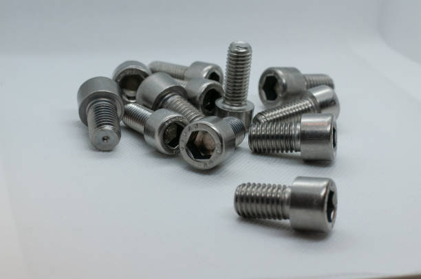 istock Shot of many cap screws with hexagon socket for construction on a plain background. 1441179838