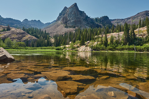 A beautiful scenery of the Lake Blanche surrounded by Wasatch Mountains near Salt Lake City, Utah, USA