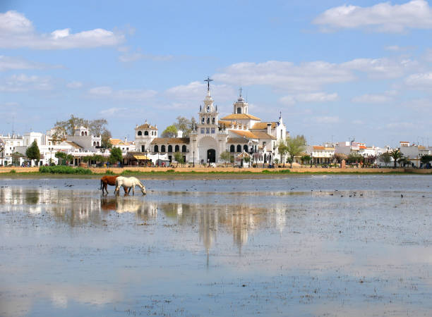 El Rocio - Sanctuary of Our Lady - with horses in foreground