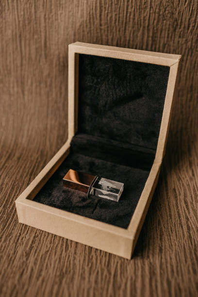 istock Vertical shot of a crystal USB flash drive in a box 1441180787