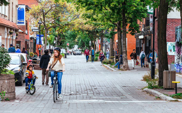 Montreal, Canada - People cycling in Le Plateau district.