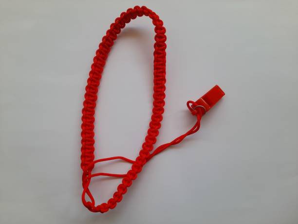 istock rope knot with whistle seen from above on a white background. 1441180844
