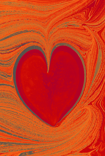 A heart shape on a marbling painting pattern background
