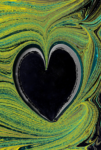 A heart shape on a marbling painting pattern background
