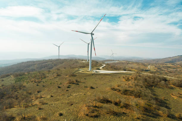 istock electricity generation from windmills in forest area, renewable energy drone view 1441182050