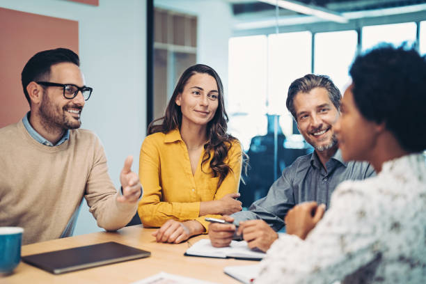 istock Group of business persons having a meeting 1441182875