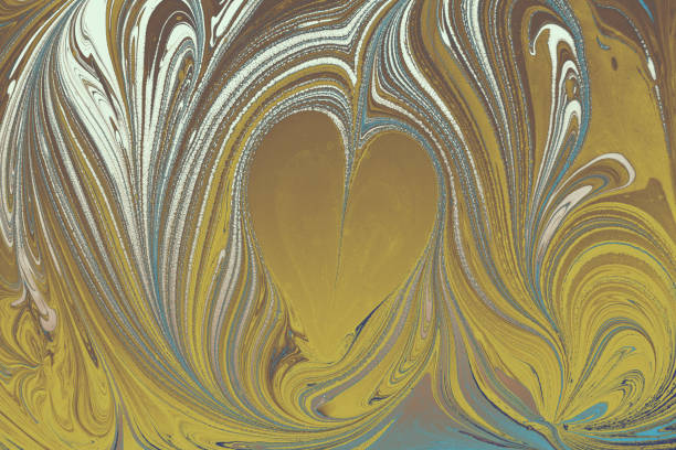 A heart shape on a marbling painting pattern background