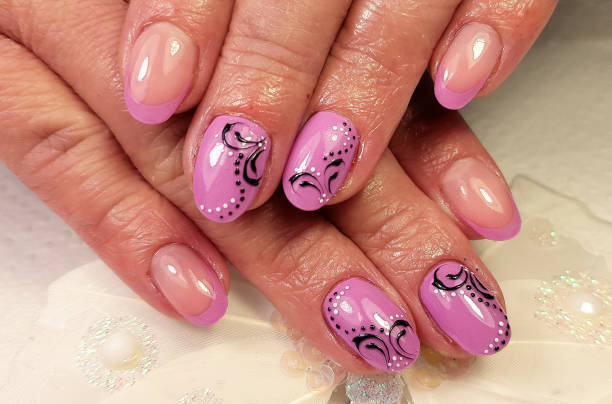 istock modern gel nails painted  in close-up 1441184726