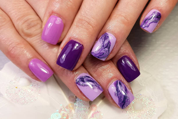 istock modern gel nails painted  in close-up 1441184808